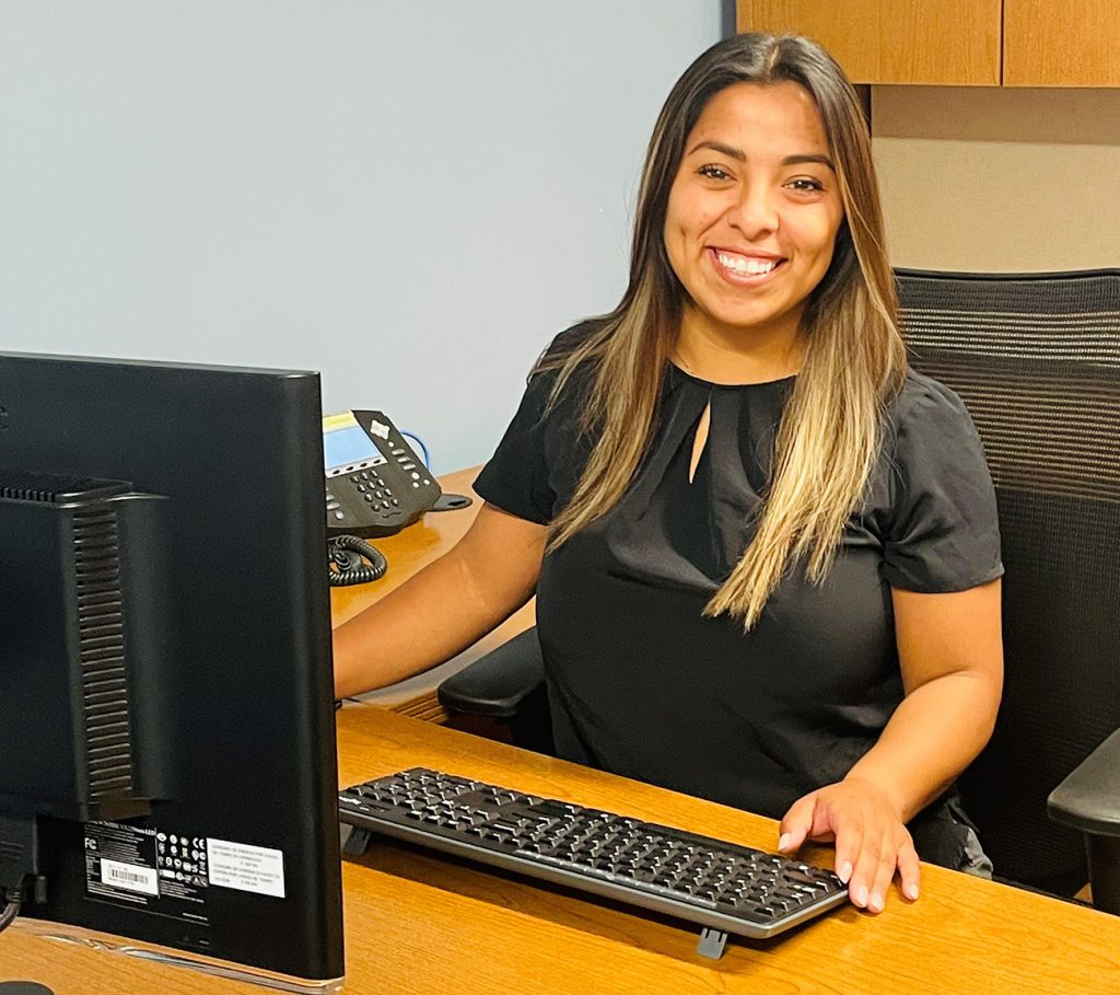 Diana Martinez at desk